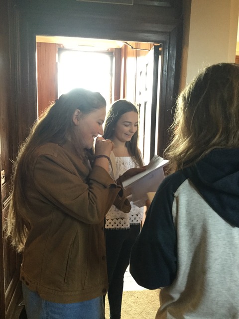 Girls looking at their results together. Anna Woodman (on the left), Katie Marlow (on the right)