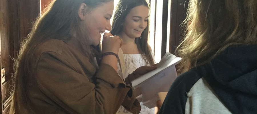 Girls looking at their results together. Anna Woodman (on the left), Katie Marlow (on the right)